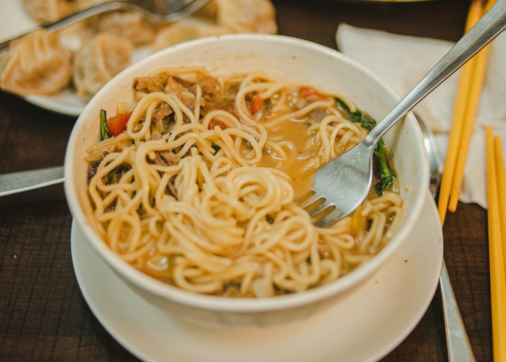 white pasta on white ceramic bowl